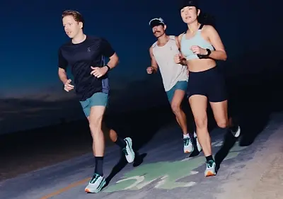 Group of runners wearing On Cloudmonster running shoes