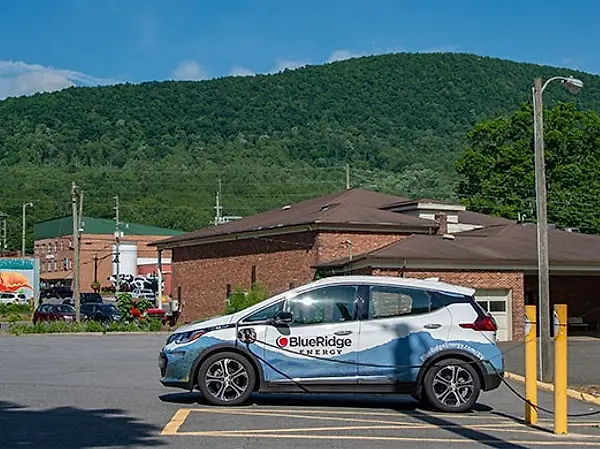 A electric vehicle charging in the North Carolina mountains